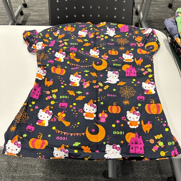 Ladies size xs (3) and small (4) Halloween scrub tops. - Picture 12 of 15
